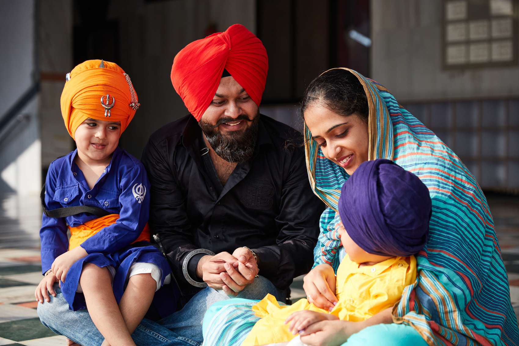 Modern Sikh Family with Children Indoors
